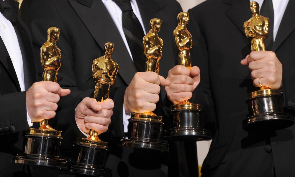 Five Men Holding Oscars