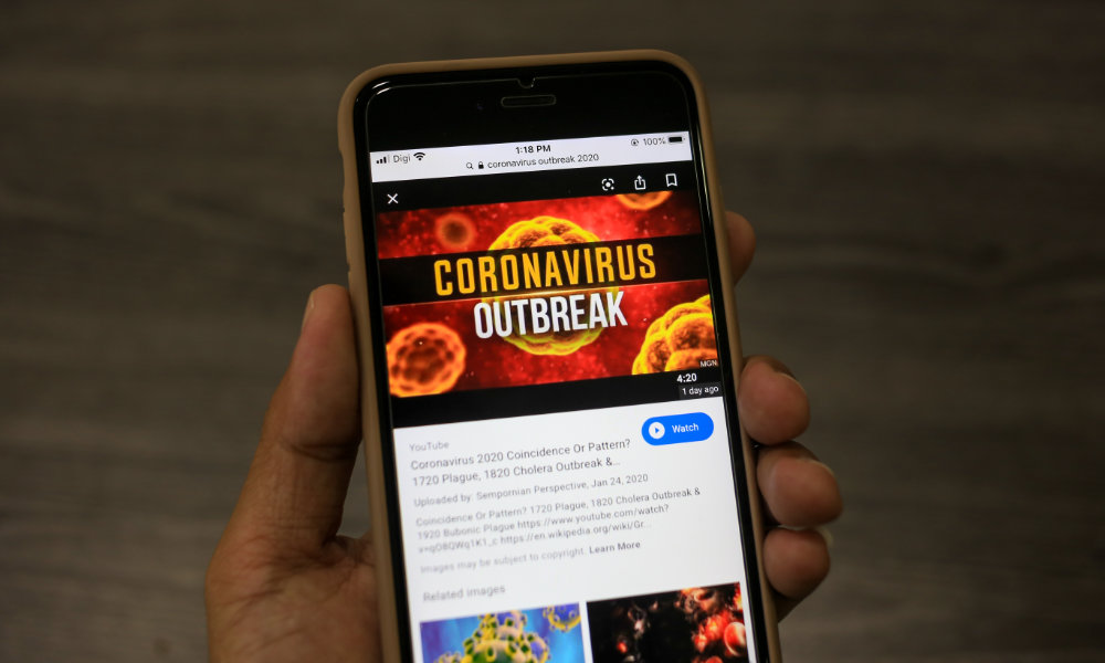 Coronavirus news on iPhone screen