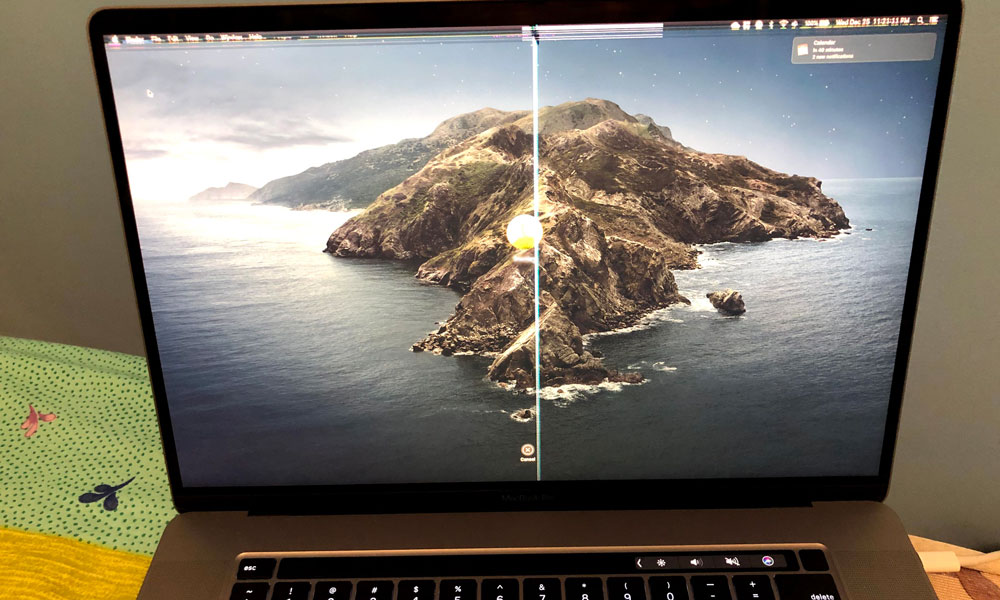 Broken 16 inch MacBook from webcam cover