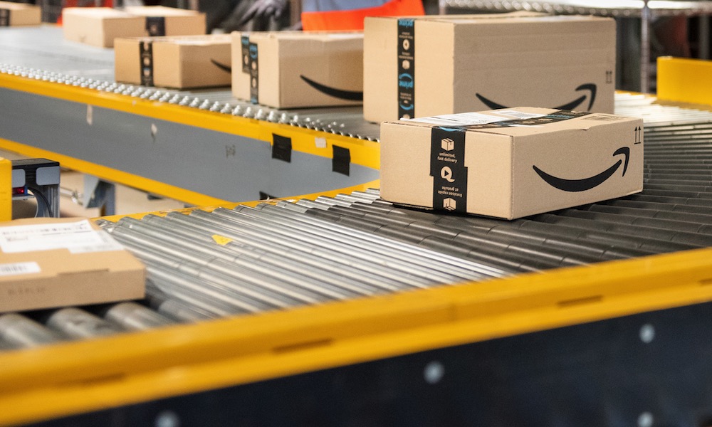 Amazon Boxes Coming Down Conveyer Belt