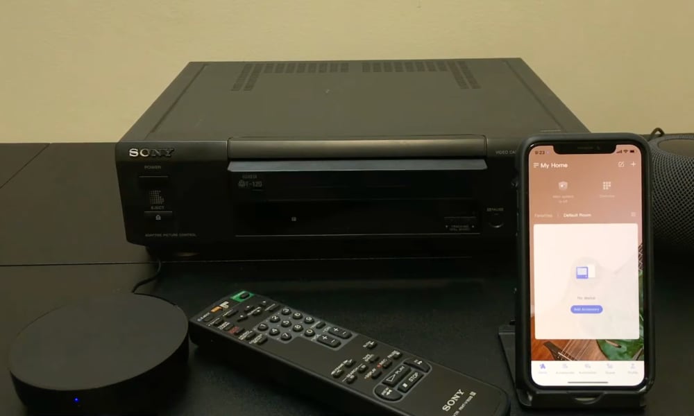 Aqara M2 hub with VCR and iPhone.jpg
