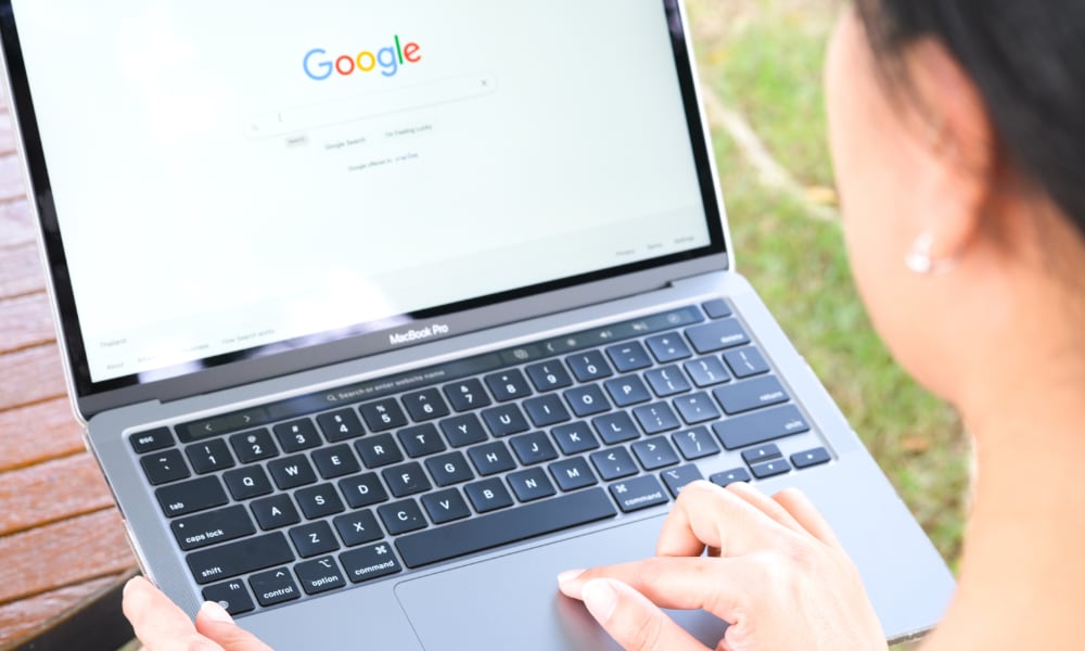 woman using Google search MacBook Pro